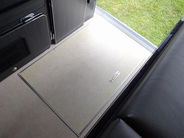 ハイエースワゴン キャンピングカー リンエイ バカンチェスプライベート バンコン シンク DC冷蔵庫 べバストFFヒーター ツインサブバッテリー 走行充電 インバーター2000W ソーラーパネル 電子レンジ 走行時リアクーラー・リアヒーター 給排水タンク 液晶テレビ(36枚目)