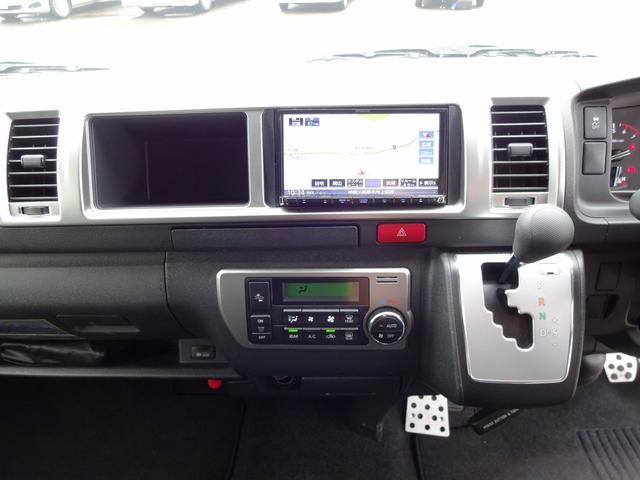 ハイエースワゴン キャンピングカー リンエイ バカンチェスプライベート バンコン シンク DC冷蔵庫 べバストFFヒーター ツインサブバッテリー 走行充電 インバーター2000W ソーラーパネル 電子レンジ 走行時リアクーラー・リアヒーター 給排水タンク 液晶テレビ(51枚目)