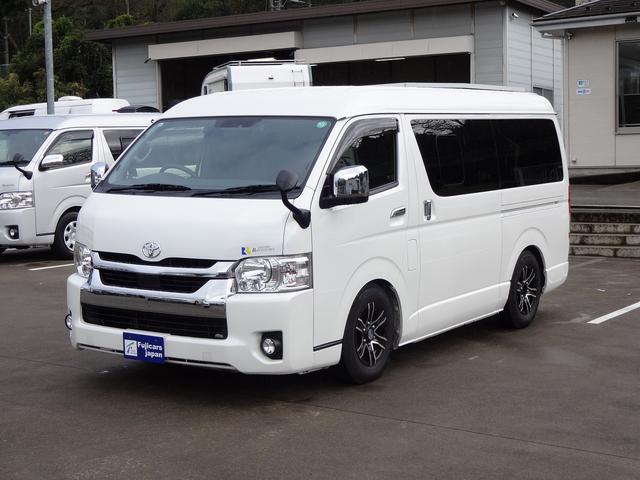 ハイエースワゴン キャンピングカー リンエイ バカンチェスプライベート バンコン シンク DC冷蔵庫 べバストFFヒーター ツインサブバッテリー 走行充電 インバーター2000W ソーラーパネル 電子レンジ 走行時リアクーラー・リアヒーター 給排水タンク 液晶テレビ(65枚目)