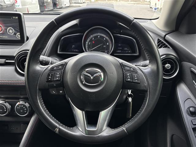 デミオ ＸＤツーリング　純正ナビ　ヘッドアップディスプレイ　ディーゼルターボ　バックカメラ　ＥＴＣ　パドルシフト　チルトステアリング　クルーズコントロール　ステアリングスイッチ　　横揺れ防止装置　衝突軽減　純正アルミホイール（2枚目）