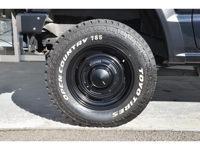 ジムニー ＸＧ　ＤＡＭＤカスタム　リフトアップ　ＤＥＡＮホイール５本　ルーフキャリア　オーニング　カロッツエリア９インチナビ　ＲＥＩＺヘッドライトＬＥＤ　ワンオーナー　クロスカントリー７８５ホワイトレター（9枚目）