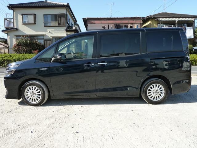 ヴォクシー ハイブリッドV 3列シート ETC ナビ エアコン ABS エアバック キーレス スマートキー Fシートヒーター フルセグTV 純正エアロ 純正AW15inc 電動両スライドドア(5枚目)