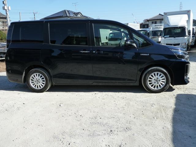 ヴォクシー ハイブリッドV 3列シート ETC ナビ エアコン ABS エアバック キーレス スマートキー Fシートヒーター フルセグTV 純正エアロ 純正AW15inc 電動両スライドドア(6枚目)