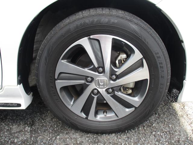 フリードハイブリッド ハイブリッド・Ｇホンダセンシング　純正メモリナビ　バックカメラ　ＥＴＣ　ホンダセンシング　両側電動スライドドア　軽減ブレーキ　キーフリーシステム　１オ－ナ－　記録簿　ＤＶＤ再生可能　ＥＣＯＮ　禁煙　後カメラ　Ａクルーズ　シートＨ（24枚目）