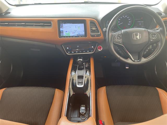 ヴェゼル ハイブリッドＺ・ホンダセンシング　ホンダセンシング　純正ナビ　フルセグＴＶ　バックカメラ　アダプティブクルーズコントロール　ＬＥＤ　ハーフレザー　パワーシート　シートヒーター　純正１７インチＡＷ　パドルシフト　ＥＴＣ　禁煙車（2枚目）