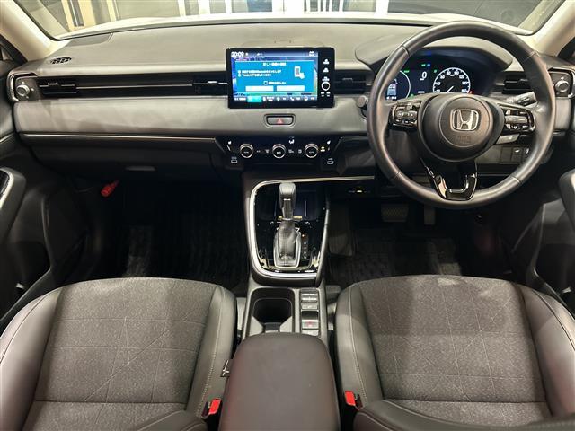 ヴェゼル ｅ：ＨＥＶ　Ｚ　ホンダセンシング　純正ナビ　バックカメラ　パワーバックドア　レーダークルーズコントロール　ＬＥＤ　ハーフレザーシート　シートヒーター　純正アルミ　ブラインドスポットモニター　ワイヤレス充電　純正ＥＴＣ（2枚目）