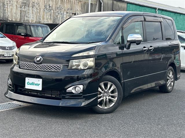 ヴォクシー ZS 煌 ワンオーナー 禁煙車 モデリスタエアロ スマートキー プッシュスタート フリップダウンモニター ETC 両側パワースライドドア 純正メモリナビ(TV/BT/DVD/ラジオ) バックカメラ 保証書(32枚目)