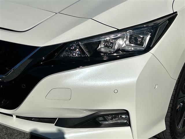 リーフ Ｇ　１オーナー　純正ナビ　ＦＭ／ＡＭ／ＵＳＢ／ＢＴ／ＴＶ／ＤＶＤ／ＣＤ　ＥＴＣ　シートヒーターＤＮ　ステアリングヒーター　追従クルコン　Ｐアシスト　３６０度カメラ　純正フロア　ＬＥＤヘッド　保証書　取説（32枚目）