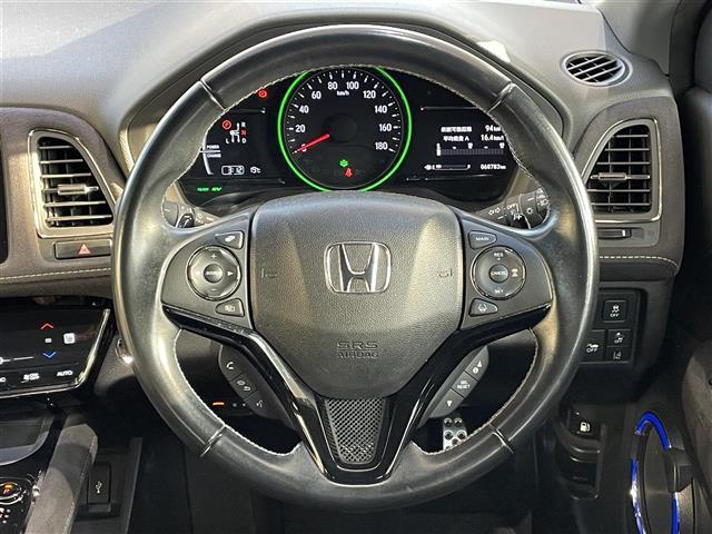 ヴェゼル ハイブリッドＲＳ・ホンダセンシング　純正メモリナビ　Ｈｏｎｄａ　ＳＥＮＳＩＮＧ　バックカメラ　アイドリングストップ　シートヒーター　ハーフレザーシート　純正１８インチＡＷ　プッシュスタート　スマートキー　ＥＴＣ（12枚目）