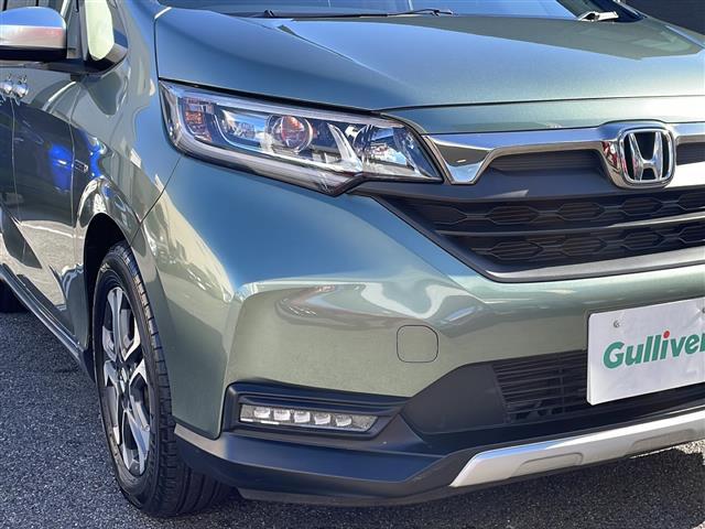 フリードハイブリッド ハイブリッド・クロスターホンダセンシング 禁煙車 ワンオーナー 純正ナビ【VXM-224VFi】 バックカメラ フルセグTV ブルートゥース ホンダセンシング ルーフレール 合皮+ファブリックシート 前席シートヒーター ETC 純フロアマット(21枚目)