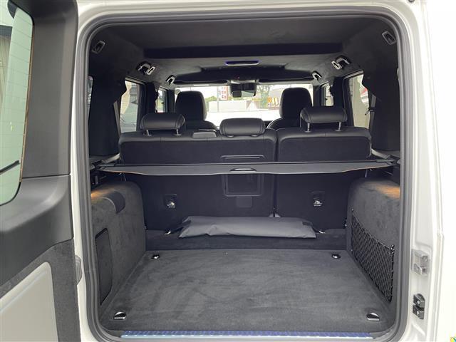 Ｇクラス Ｇ５８０　ウィズＥＱテクノロジーエディション１　ワンオーナー　サンルーフ　グレー／黒革シート　ブルメスター　カーボンインテリアパネル　　アダプティブダンピング　レーダーセーフティＰＫＧ　ワイヤレス充電　純正ナビ　全方位カメラ　ＡＭＧ２０ＡＷ　ＬＥＤ（22枚目）