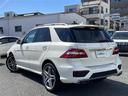 ML63 AMG 純正ナビ プレミアムサウンドHarmanKardon パノラマミックススライディングルーフ エアサス パワーバックドア バックカメラ&サイドカメラクルーズコントロール パワーシート シートヒーター(31枚目)