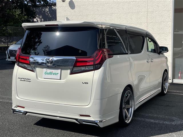 アルファード ３．５エグゼクティブラウンジ　モデリスタエアロ／Ｗサンルーフ／ＪＢＬ純ナビ／フルセグ／全方位モニタ／黒革電動シート／シートヒータ／後席エアシート／オットマン／両パワスラ／電動バックドア／ＰＣＳ／外２１ＡＷ／ＴＥＩＮ車高調（36枚目）