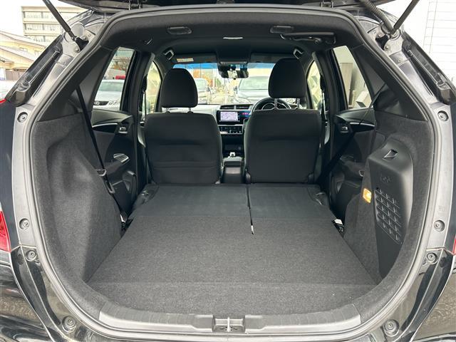 フィットハイブリッド Ｓパッケージ　純正ナビＣＤ／ＤＶＤ／ＴＶ／ＡＭ／ＦＭ／Ｂｌｕｅｔｏｏｔｈ／フルセグ　バックカメラ　ＥＴＣ　前方ドライブレコーダー　クルーズコントロール　純正アルミホイール　スタッドレスタイヤ　スペアキー（25枚目）