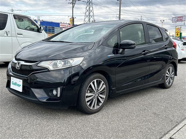 フィットハイブリッド Ｓパッケージ　純正ナビＣＤ／ＤＶＤ／ＴＶ／ＡＭ／ＦＭ／Ｂｌｕｅｔｏｏｔｈ／フルセグ　バックカメラ　ＥＴＣ　前方ドライブレコーダー　クルーズコントロール　純正アルミホイール　スタッドレスタイヤ　スペアキー（28枚目）