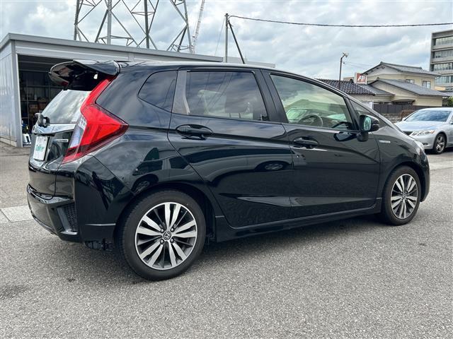 フィットハイブリッド Ｓパッケージ　純正ナビＣＤ／ＤＶＤ／ＴＶ／ＡＭ／ＦＭ／Ｂｌｕｅｔｏｏｔｈ／フルセグ　バックカメラ　ＥＴＣ　前方ドライブレコーダー　クルーズコントロール　純正アルミホイール　スタッドレスタイヤ　スペアキー（31枚目）