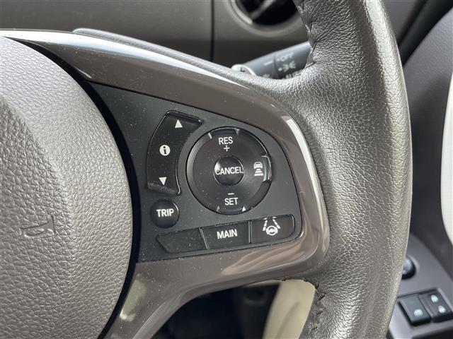 Ｎ－ＢＯＸ Ｇ・Ｌターボホンダセンシング　純正ナビ　フルセグＴＶ　レーンキープアシスト　ディスタンススイッチ　横滑り防止装置　プリクラッシュセーフティ　アイドリングストップ　ＥＴＣ　純正フロアマット　前席シートヒーター　両側パワースライドドア（12枚目）