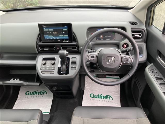 フリード e:HEVクロスター ギャザーズディスプレイオーディオ 両側パワースライドドア バックカメラ ホンダセンシング BSM オートハイビーム LEDヘッドランプ 革巻きステアリング シートヒーター(40枚目)