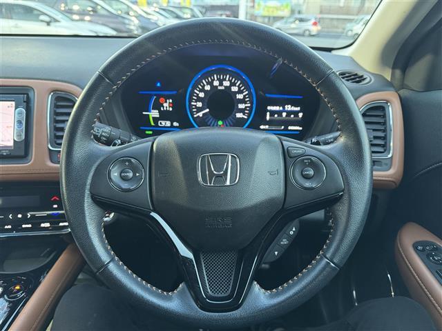 ヴェゼル ハイブリッドＺ　ワンオーナー　あんしんＰＫＧ　純正ナビ　ワンセグＴＶ　Ｂｌｕｅｔｏｏｔｈ　バックカメラ　ハーフレザーシート　シートヒーター　純正１７インチＡＷ　ＬＥＤライト　ＥＴＣ　スマートキー（23枚目）