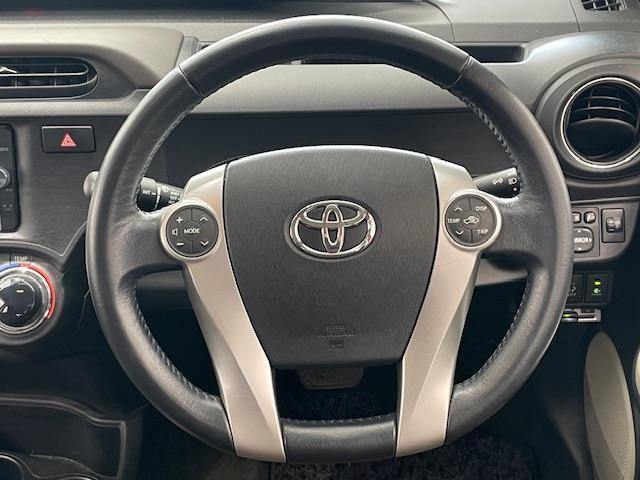 アクア G 純正ナビ/Bluetooth/CD/DVD/フルセグTV/AM/FM/ETC/バックカメラ/シートヒーター/ECOモード/EVモード/革巻きステアリング/ステアリングスイッチ/オートライト(22枚目)