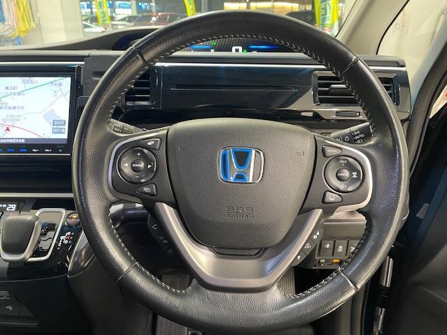 ステップワゴンスパーダ スパーダハイブリッド　Ｇ　ホンダセンシング　ホンダセンシング／衝突軽減ブレーキ／クルーズコントロール／レーンキープ／純正ナビ／バックカメラ／後席モニター／両側パワースライドドア／電子パーキング／オートブレーキホールド／ＥＴＣ／ドライブレコーダー（22枚目）