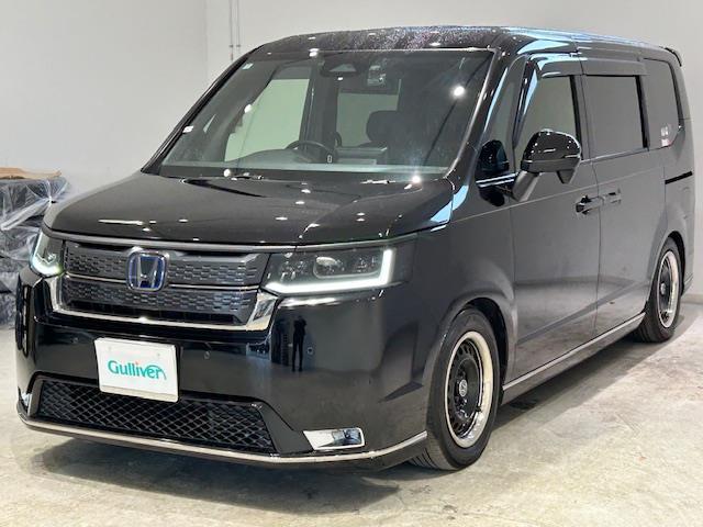 ステップワゴン e:HEVスパーダ ワンオーナー/ホンダセンシング/BSM/純正ナビ/バックカメラ/前後ドラレコ/ETC/後席モニター/電子パーキング/パワーテールゲート/両側パワスラ/車高調/シートヒーター/パワーシート/オットマン(20枚目)