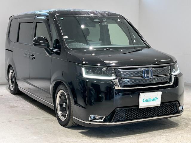 ステップワゴン e:HEVスパーダ ワンオーナー/ホンダセンシング/BSM/純正ナビ/バックカメラ/前後ドラレコ/ETC/後席モニター/電子パーキング/パワーテールゲート/両側パワスラ/車高調/シートヒーター/パワーシート/オットマン(35枚目)