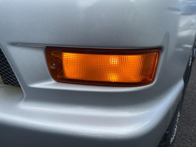 デリカスペースギア 4ドア3.0 20thリミテッド ハイR 4WD ワンオーナー/4WD/カーオーディオ/センターデフロック/ETC/純正アルミホイール/電動格納ミラー/3列シート/ウォークスルー/社外フロアマット/ドアバイザー/片側スライドドア/ABS/ドアバイザー(72枚目)