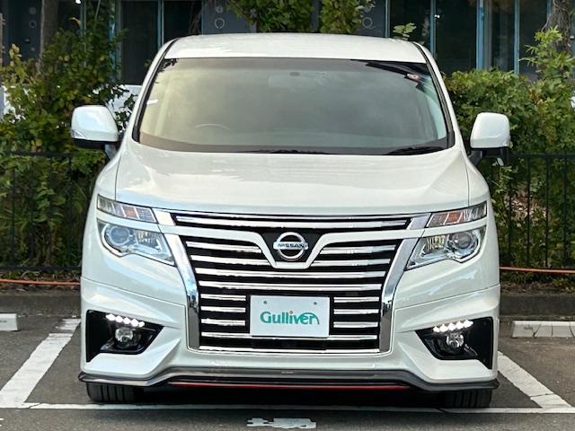 エルグランド 250ハイウェイスターSホワイトレザーアーバンクロム ニスモフルエアロ/社外ナビ/ETC/前後ドライブレコーダー/フリップダウンモニター/両側パワースライドドア/クルーズコントロール/MTモード付きAT/ハーフレザーシート/オットマン/プッシュスタート(19枚目)