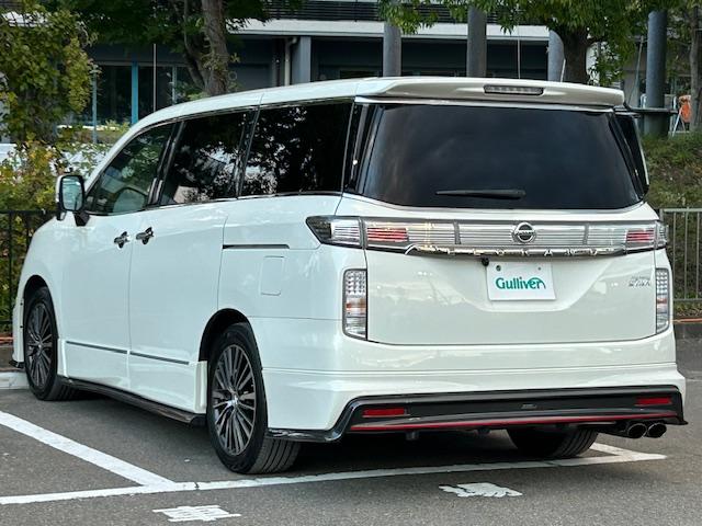 エルグランド 250ハイウェイスターSホワイトレザーアーバンクロム ニスモフルエアロ/社外ナビ/ETC/前後ドライブレコーダー/フリップダウンモニター/両側パワースライドドア/クルーズコントロール/MTモード付きAT/ハーフレザーシート/オットマン/プッシュスタート(21枚目)