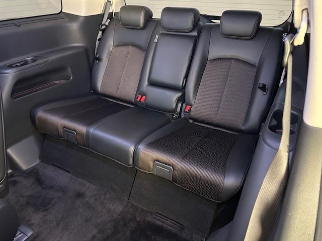 エルグランド 250ハイウェイスターSホワイトレザーアーバンクロム ニスモフルエアロ/社外ナビ/ETC/前後ドライブレコーダー/フリップダウンモニター/両側パワースライドドア/クルーズコントロール/MTモード付きAT/ハーフレザーシート/オットマン/プッシュスタート(56枚目)