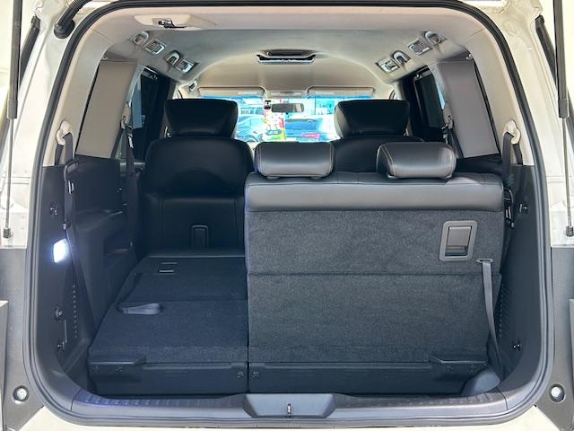 エルグランド 250ハイウェイスターSホワイトレザーアーバンクロム ニスモフルエアロ/社外ナビ/ETC/前後ドライブレコーダー/フリップダウンモニター/両側パワースライドドア/クルーズコントロール/MTモード付きAT/ハーフレザーシート/オットマン/プッシュスタート(58枚目)