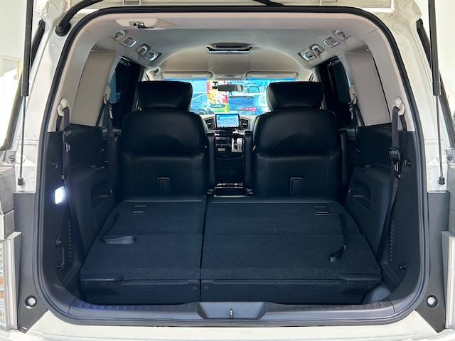 エルグランド 250ハイウェイスターSホワイトレザーアーバンクロム ニスモフルエアロ/社外ナビ/ETC/前後ドライブレコーダー/フリップダウンモニター/両側パワースライドドア/クルーズコントロール/MTモード付きAT/ハーフレザーシート/オットマン/プッシュスタート(59枚目)