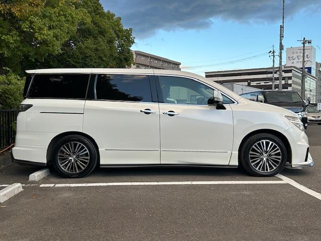 エルグランド 250ハイウェイスターSホワイトレザーアーバンクロム ニスモフルエアロ/社外ナビ/ETC/前後ドライブレコーダー/フリップダウンモニター/両側パワースライドドア/クルーズコントロール/MTモード付きAT/ハーフレザーシート/オットマン/プッシュスタート(77枚目)