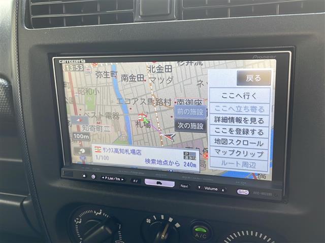 ジムニー ワイルドウインド ロッソモデロマフラー・社外ナビ・ターボ・4WD・前後ドラレコ・ETC・シートヒーター・背面タイヤ(2枚目)