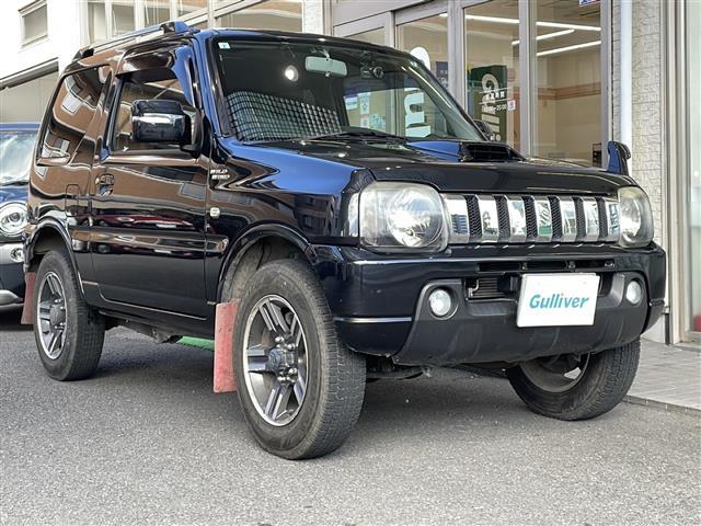 ジムニー ワイルドウインド ロッソモデロマフラー・社外ナビ・ターボ・4WD・前後ドラレコ・ETC・シートヒーター・背面タイヤ(23枚目)