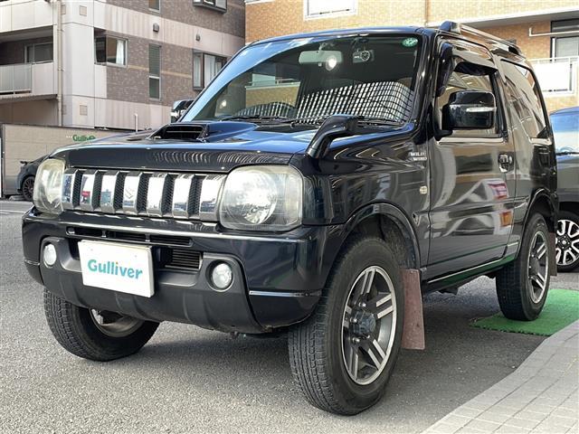 ジムニー ワイルドウインド ロッソモデロマフラー・社外ナビ・ターボ・4WD・前後ドラレコ・ETC・シートヒーター・背面タイヤ(25枚目)