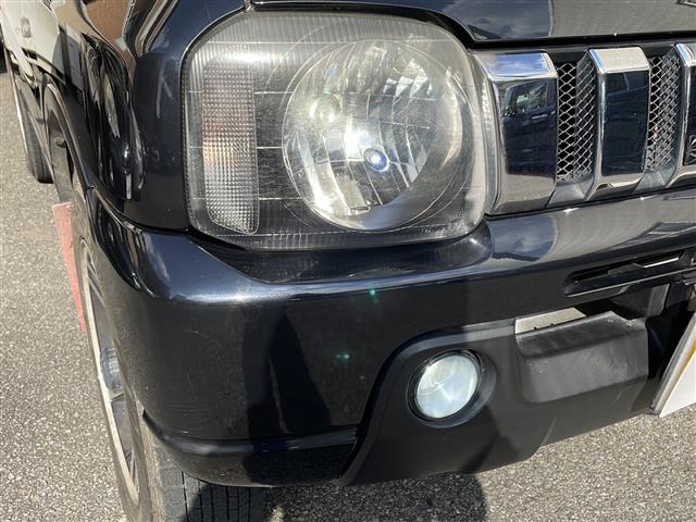 ジムニー ワイルドウインド ロッソモデロマフラー・社外ナビ・ターボ・4WD・前後ドラレコ・ETC・シートヒーター・背面タイヤ(30枚目)