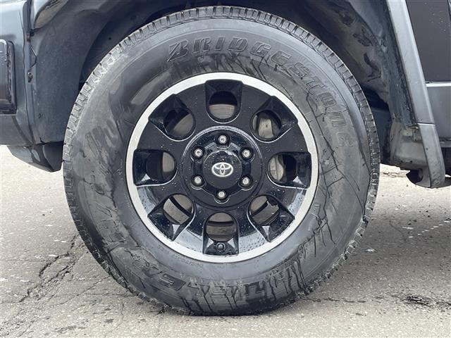 FJクルーザー ブラックカラーパッケージ 寒冷地仕様車 純正ディーラーOPナビ ワンセグTV バックカメラ 革巻きステアリング ステアリングスイッチ クルーズコントロール JAOSサイドステップ 背面タイヤ 純正エンジンスターター(39枚目)
