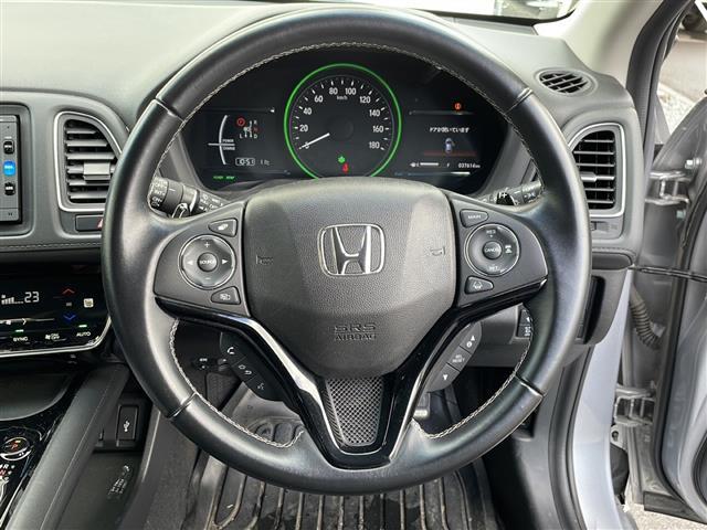ヴェゼル ハイブリッドＺ・ホンダセンシング　４ＷＤ／禁煙車／純正メモリナビ／ＣＤ／ＤＶＤ／ＳＤ／ＢＴ／ＵＳＢ／１セグ／バクカメラ／ホンダセンシング／衝突軽減ブレーキ／レーンキープ／レーダークルーズコントロール／誤発進抑制／シートヒーター／ＥＴＣ（19枚目）