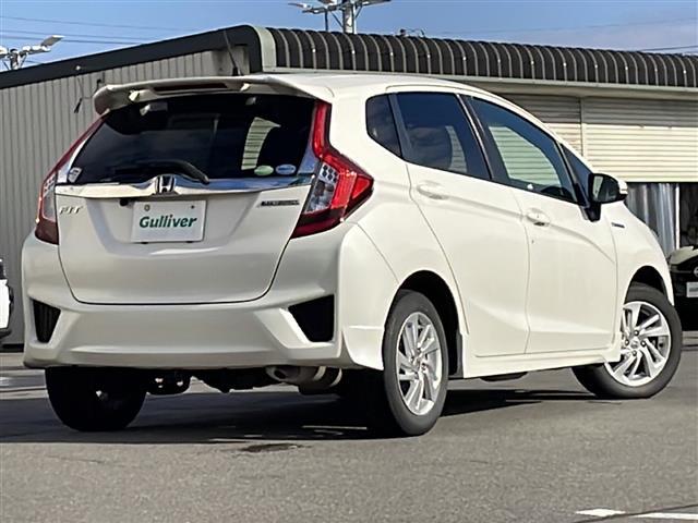 フィットハイブリッド Sパッケージ 4WD/禁煙車/純正SDナビ/CD/DVD/SD/BT/フルセグ/バックカメラ/CTBA/クルーズコントロール/パドルシフト/オートライト/LEDヘッドライト/フォグライト/ETC/社外AW夏タイヤ積(38枚目)