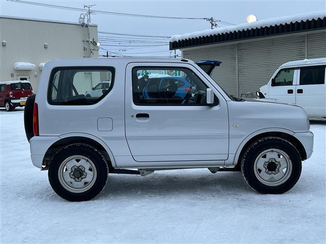 ジムニー XG ワンオーナー/社外オーディオ/CD/USB/AUX/4WD/純正フロアマット/キーレスキー/背面タイヤ/保証書/取扱説明書/ターボ/ライトレベライザー/ABS/パワーウィンドウ(17枚目)