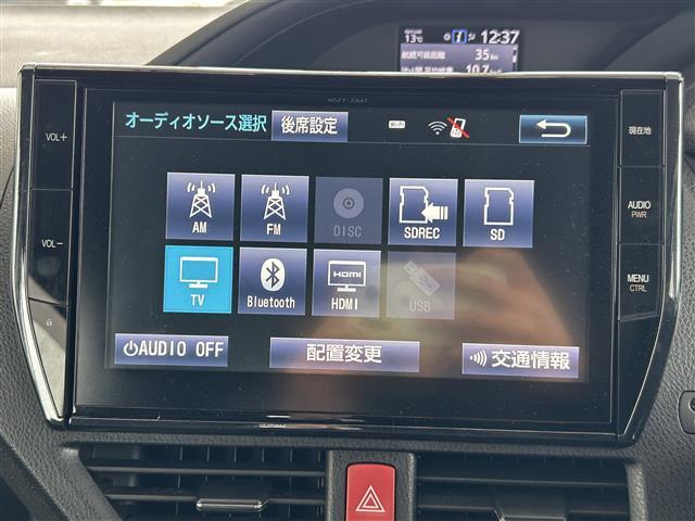 ヴォクシー ハイブリッドV フリップダウンモニター/10型純正ナビ/両側パワースライドドア/DN席シートヒーター/ビルトインETC/前後ドライブレコーダー/LEDヘッドライト/後席独立エアコン/スペアキー(3枚目)