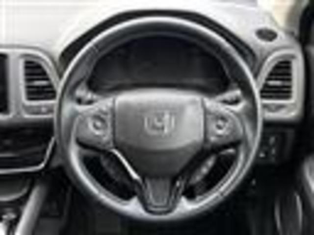 ヴェゼル ハイブリッドZ・ホンダセンシング 純正ナビ(CD/DVD/FM/AM/TV/Bluetooth/HDMI)/バックカメラ/クルーズコントロール/ステアリングスイッチ/ハーフレザーシート/シートヒーター(D/N席)/ETC/純正AW(7枚目)