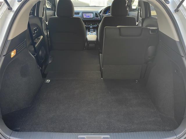 ヴェゼル ハイブリッドＸ　純正ＳＤナビ（ワンセグテレビ／Ｂｌｕｅｔｏｏｔｈ／ＡＭ／ＦＭ）・ＥＴＣ・バックカメラ・クルーズコントロール・パドルシフト・横滑り防止装置・コーナーセンサー・スマートキー・純正１６インチアルミホイール（25枚目）