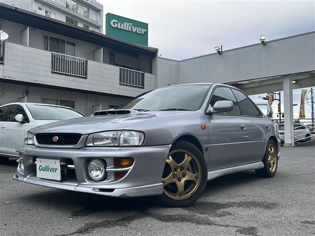 インプレッサ WRX STiバージョンVI 純正リアウィング ターボ車 5速ミッション 専用シート 社外ハードディスクナビ ETC 純正エアロ 純正16インチアルミホイール ブースト計 電圧計(12枚目)