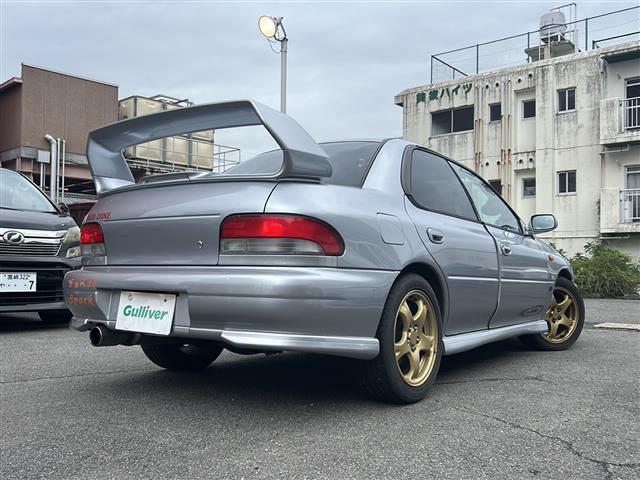 インプレッサ WRX STiバージョンVI 純正リアウィング ターボ車 5速ミッション 専用シート 社外ハードディスクナビ ETC 純正エアロ 純正16インチアルミホイール ブースト計 電圧計(13枚目)