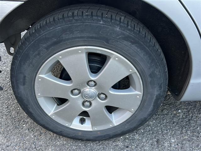 ファンカーゴ Ｇリヤリビングバージョン　社外ナビ　Ｂｌｕｅｔｏｏｔｈ　ワンセグＴＶ　ＣＤ／ＤＶＤチェンジャー　純正アルミホイール　純正フロアマット　ハロゲンライト　パワーステアリング　パワーステアリング　ルーフレール　電動格納ミラー（12枚目）