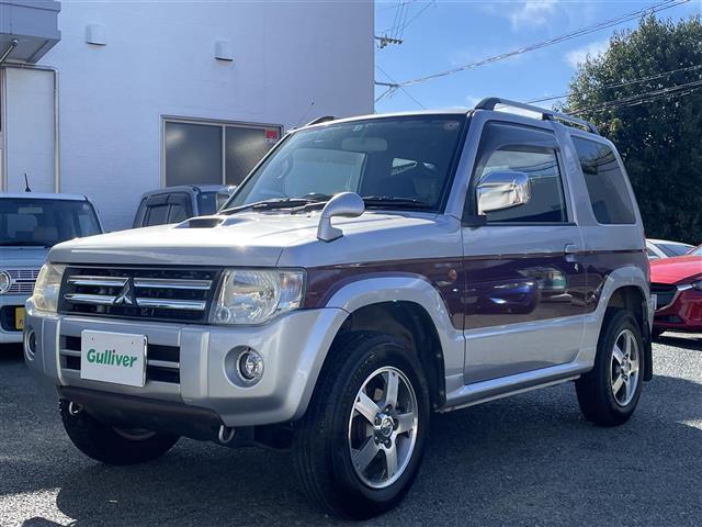 パジェロミニ エクシード SDナビ/ワンセグテレビ/CD/DVD/ETC/純正15インチアルミホイール/背面タイヤ/ルーフレール/ターボ/4WD/フロアマット/フォグライト/ドアバイザー/キーレス/スペアキー/フルフラット(2枚目)