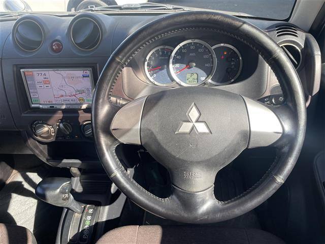 パジェロミニ エクシード SDナビ/ワンセグテレビ/CD/DVD/ETC/純正15インチアルミホイール/背面タイヤ/ルーフレール/ターボ/4WD/フロアマット/フォグライト/ドアバイザー/キーレス/スペアキー/フルフラット(9枚目)